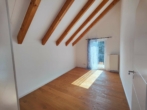 Zimmer 1 oben - Tolle Eigentumswohnung auf zwei Ebenen mit großer Terrasse, Carport und zwei Stellplätzen