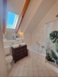 Badezimmer - Wohnen wie in einem Haus: außergewöhnliche Maisonette-Eigentumswohnung in Weitramsdorf