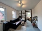 Wohnzimmer Wohnung OG - Stadtnahes Zweifamilienhaus auf traumhaftem Grundstück in Coburg