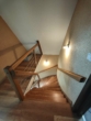 Treppe ins Obergeschoss - Ein stilvolles Zuhause mit modernem Komfort und großem Garten