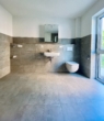 Badezimmer - NEUBAU: Exklusive 3-Zi.-Wohnung im Erdgeschoss mit sonniger Terrasse & Garten – Erstbezug