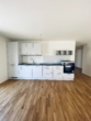 Einbauküche - NEUBAU: Exklusive 3-Zi.-Wohnung im Erdgeschoss mit sonniger Terrasse & Garten – Erstbezug