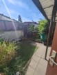 Blick in den kleinen Garten - In Vorbereitung: Haus statt Wohnung? Kleines Reihenmittelhaus für Individualisten