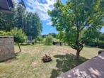 Blick in den Garten - Ein stilvolles Zuhause mit modernem Komfort und großem Garten