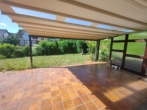 Terrasse - Großzügiges Wohnen mit Einliegerbereich, zwei große Terrassen, Wintergarten, Sauna und Doppelgarage