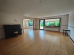 Wohnzimmer Obergeschoss - Großzügiges Wohnen mit Einliegerbereich, zwei große Terrassen, Wintergarten, Sauna und Doppelgarage