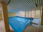 Wellnessbereich mit Schwimmbad - Mit Blick ins Grüne: Vermietete Etagenwohnung in Coburg